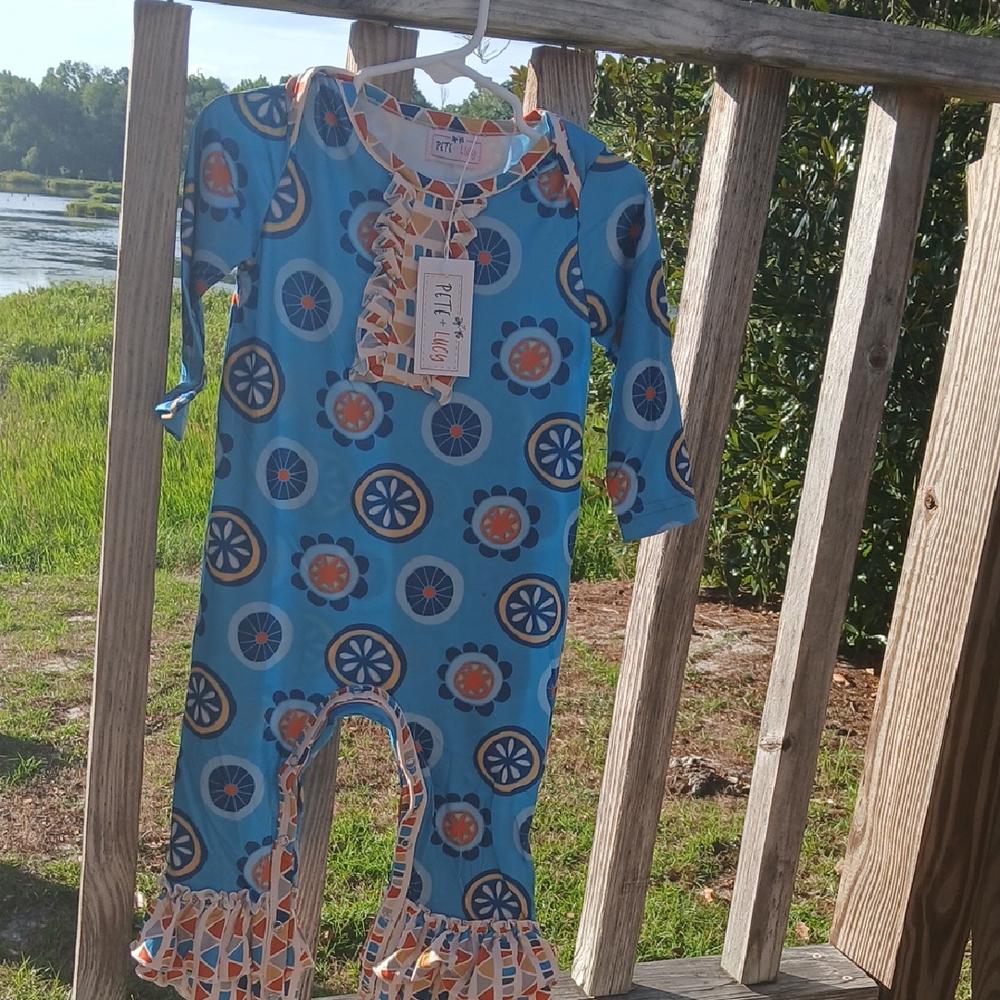 Vibrant Blue and Orange Bodysuit with Geometric Patterns